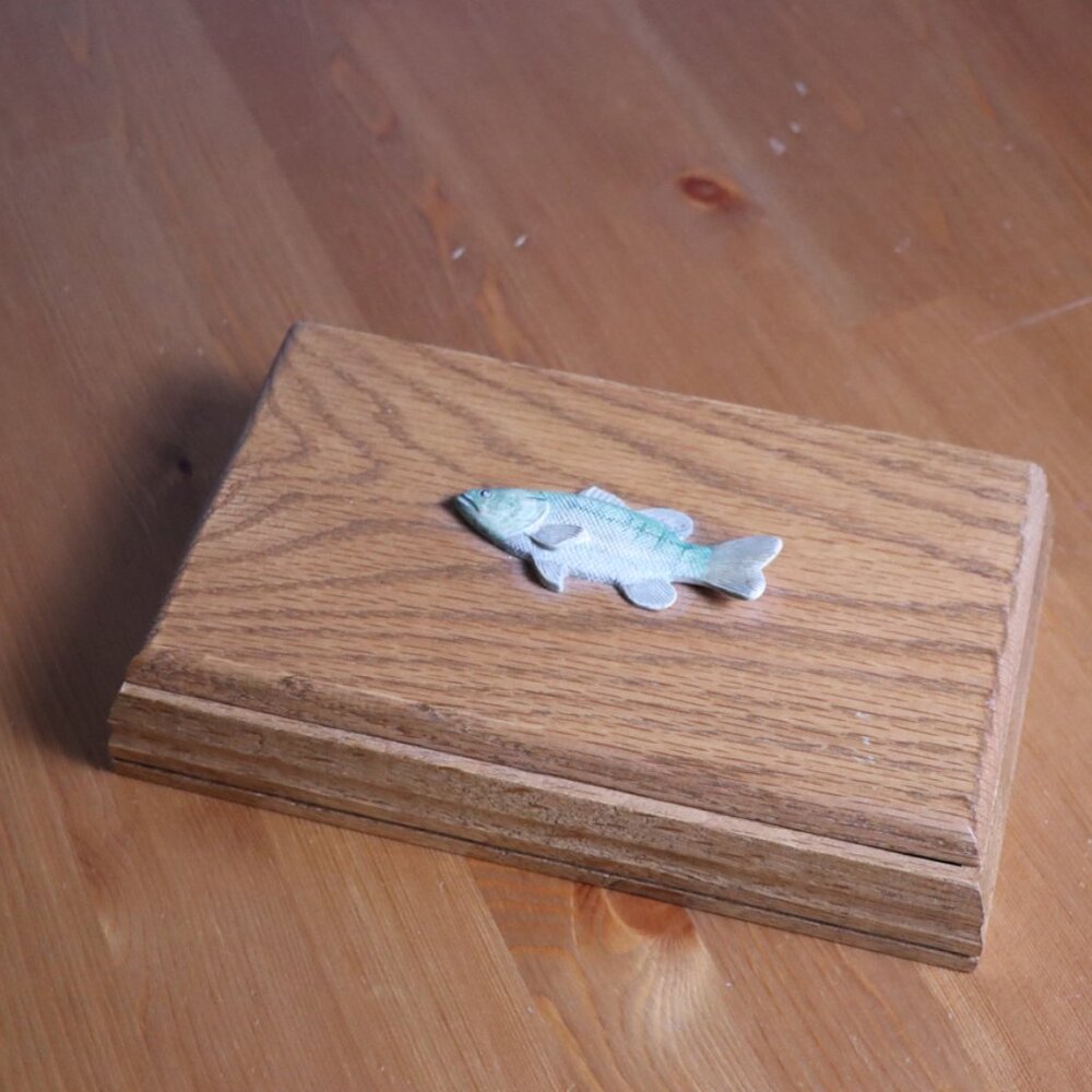 Wooden box for desk with letter opener, small carved fish on top, lid opens,
